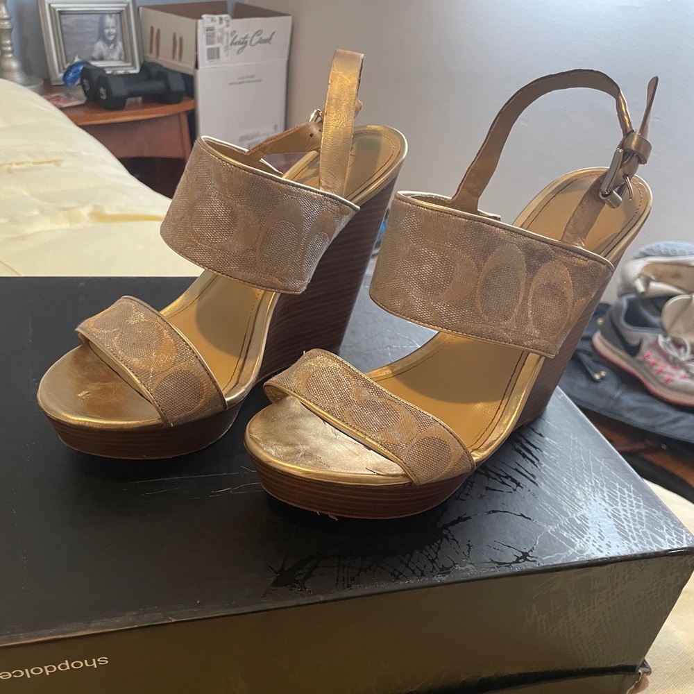Coach jezebel gold
